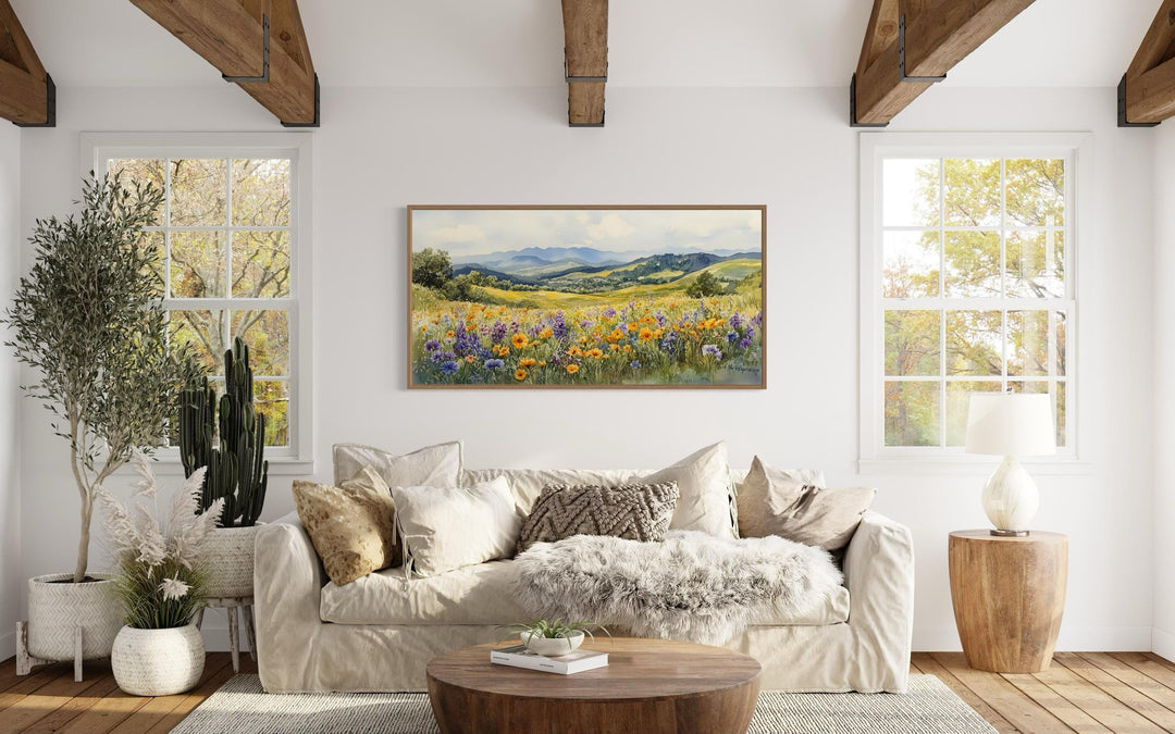 Panoramic watercolor canvas art of yellow and purple wildflowers in a field with distant mountains.