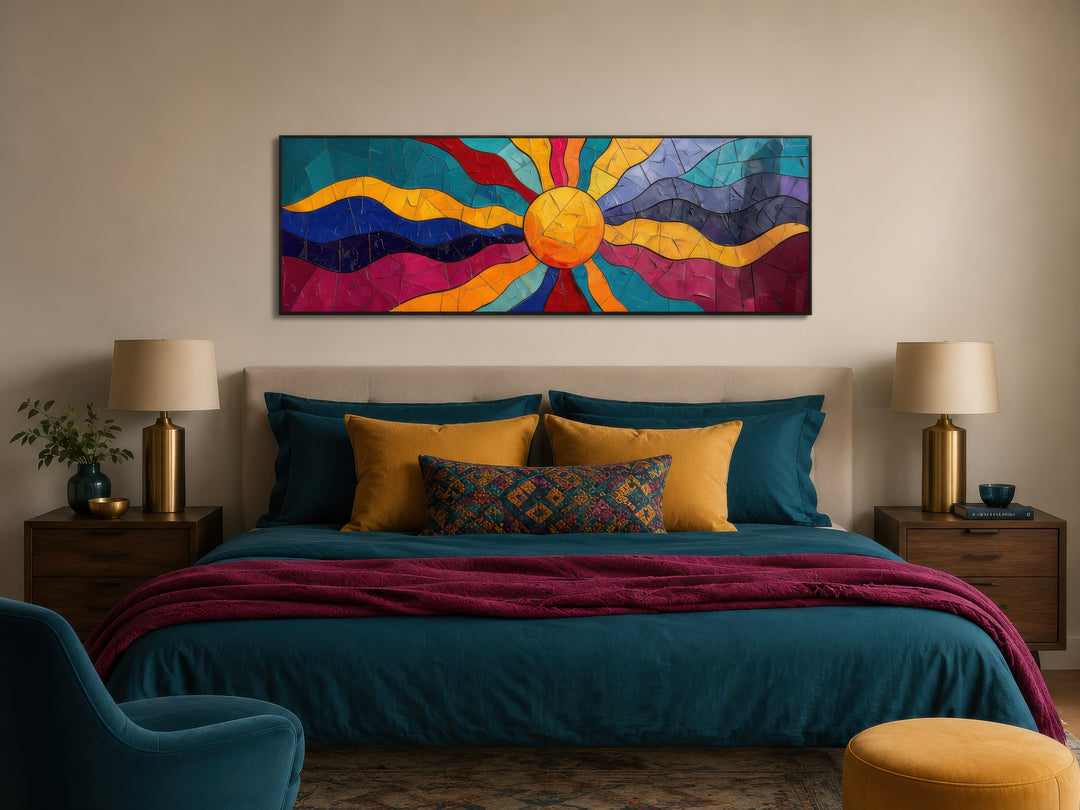 Vibrant multicolored sun long horizontal canvas wall art hanging above a bed in a modern bedroom.