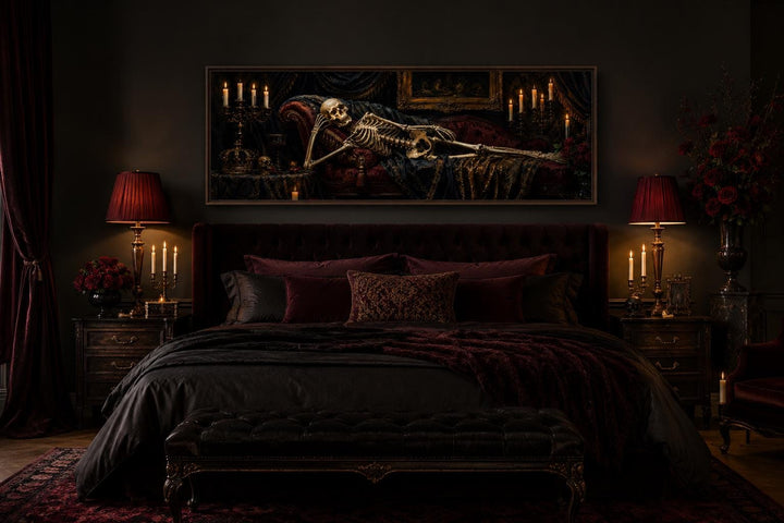 Victorian skeleton reclining on a Baroque chaise lounge canvas wall art above a dark gothic bed.