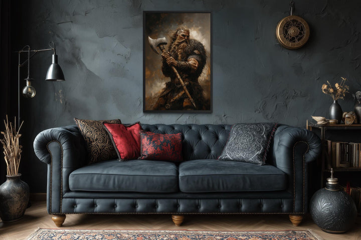 Viking warrior painting with battle axe on dark textured wall.