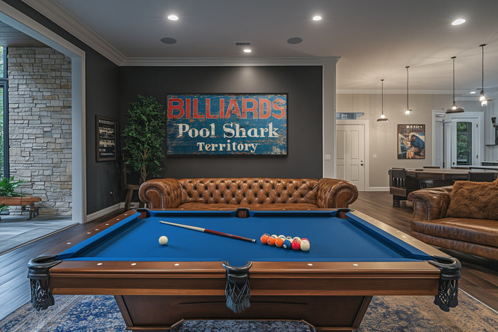 Vintage Billiards Sign with 'Pool Shark Territory' text on a dark wall above a pool table.