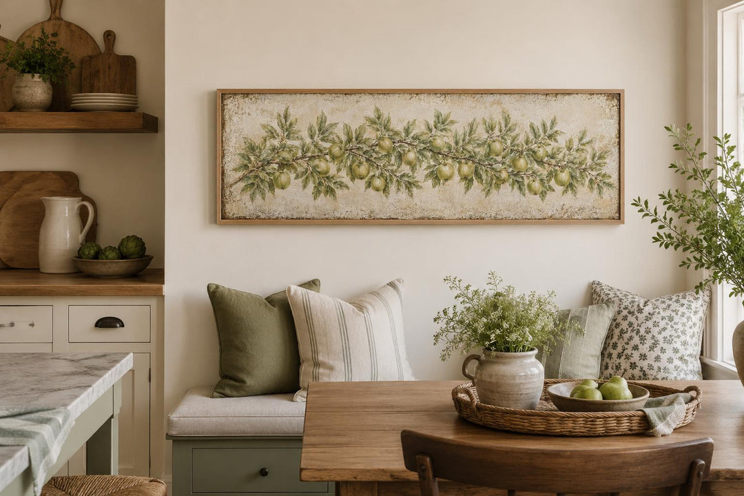 Long narrow vintage botanical canvas painting of a green apple branch in a farmhouse kitchen.