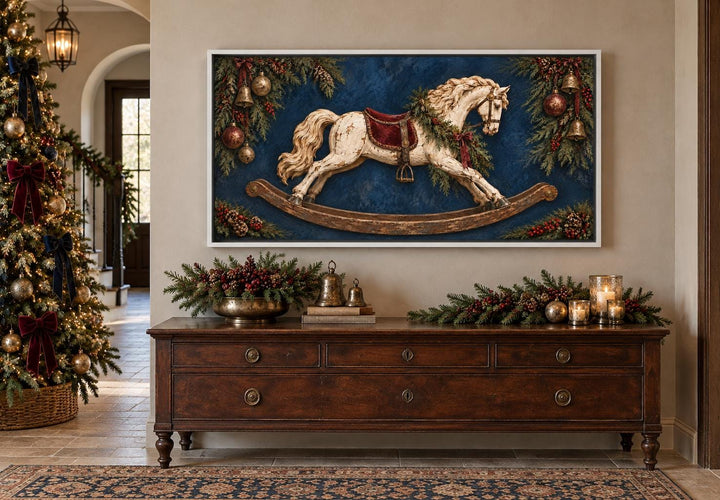 Vintage Christmas Distressed Ivory Rocking Horse framed canvas art above a wooden dresser.