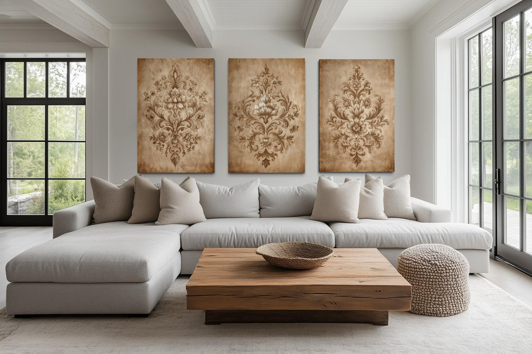 Set of three vertical canvas prints featuring vintage beige damask ornamental patterns.