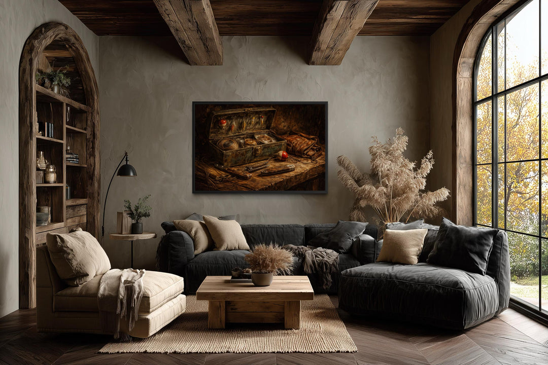 A rustic canvas painting of vintage fishing gear hangs in a cozy, earth-toned living room.
