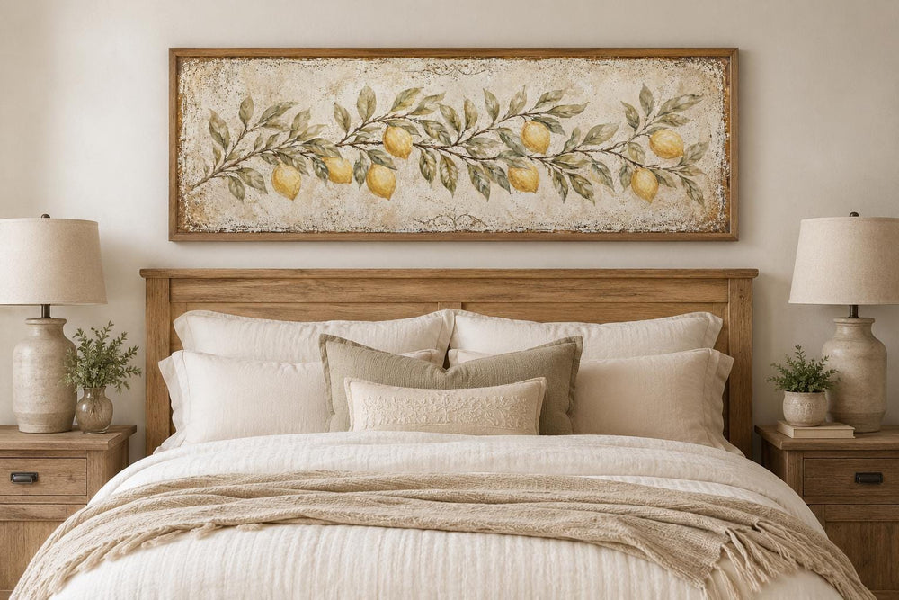 Vintage long narrow lemon botanical canvas print above a bed in a rustic farmhouse bedroom.