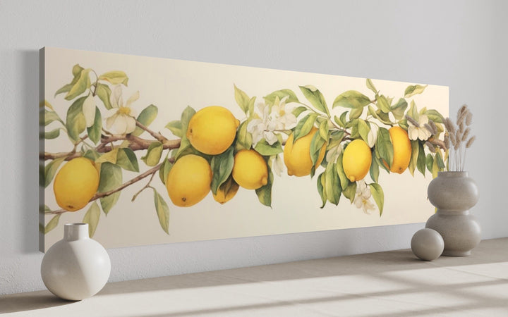 Panoramic framed canvas wall art of a vintage lemon tree branch with yellow fruit and white flowers.