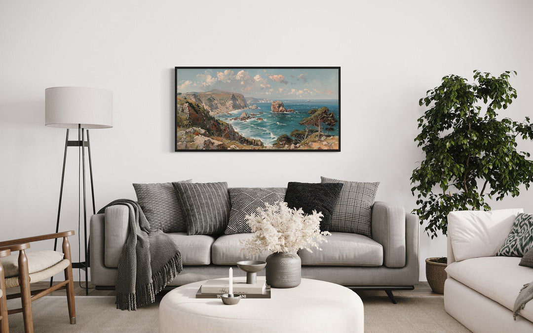 Vintage Seascape Painting above grey couch