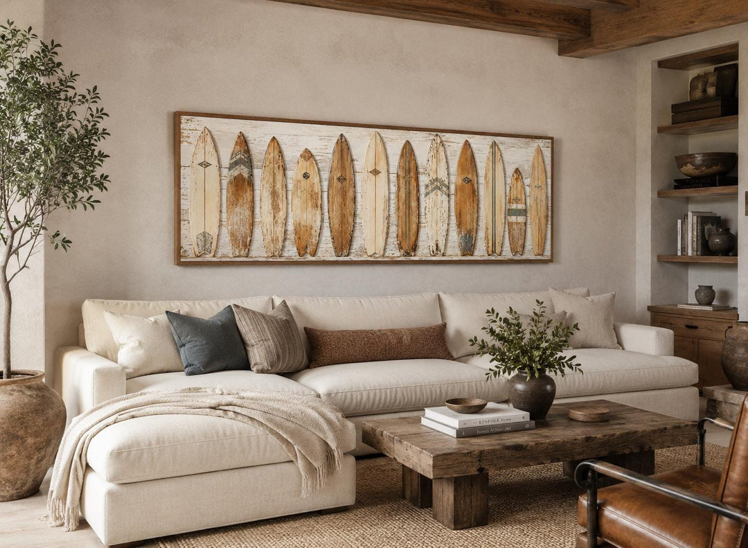 Vintage surfboard wall art with a row of weathered longboards in a warm, sun-faded coastal palette.