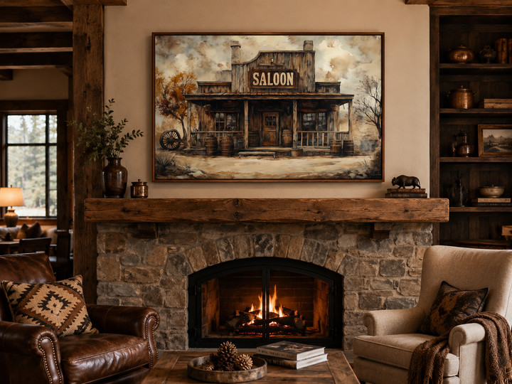Vintage Western Saloon framed canvas wall art hanging above a rustic stone fireplace.