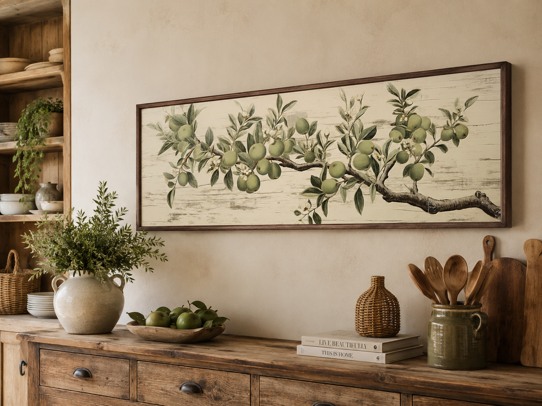 Vintage horizontal framed canvas art of an apple tree branch with green leaves and fruit.