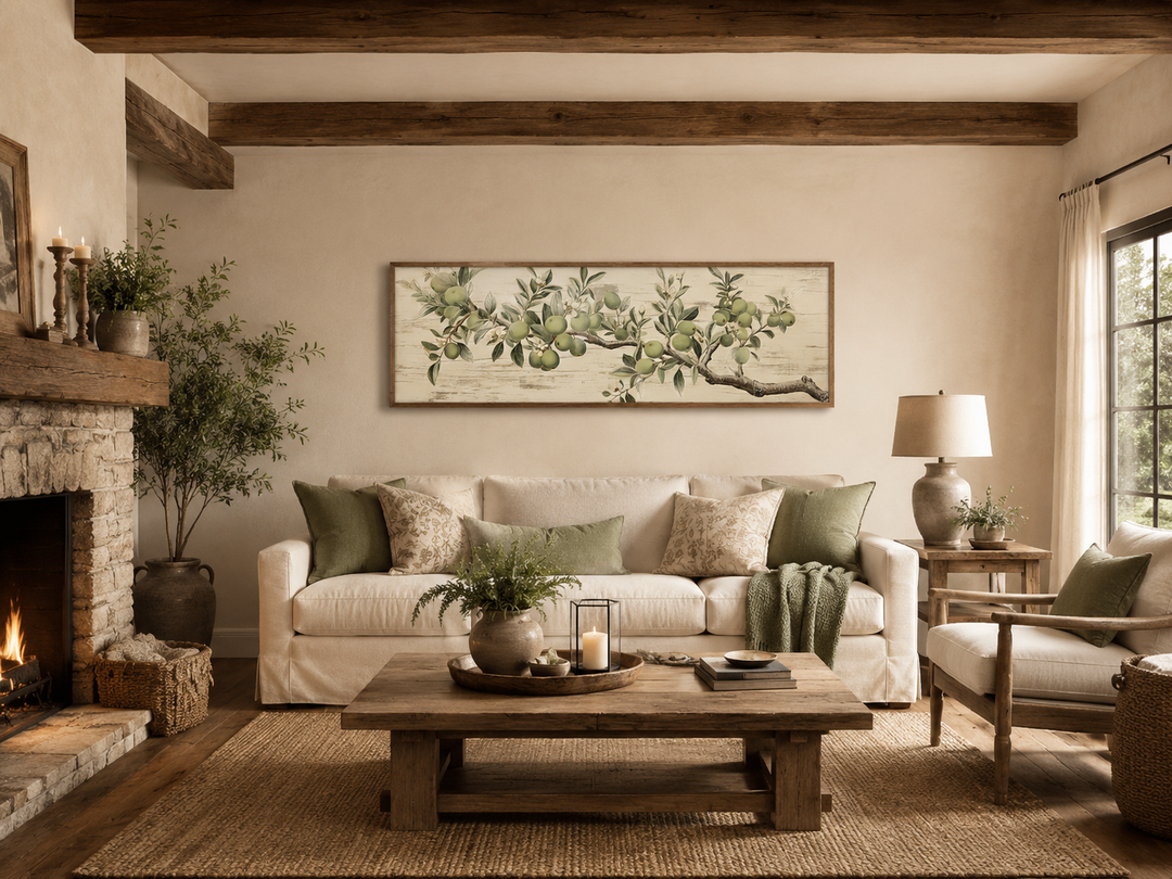 Vintage apple tree branch horizontal framed canvas wall art above a sofa in a rustic living room.