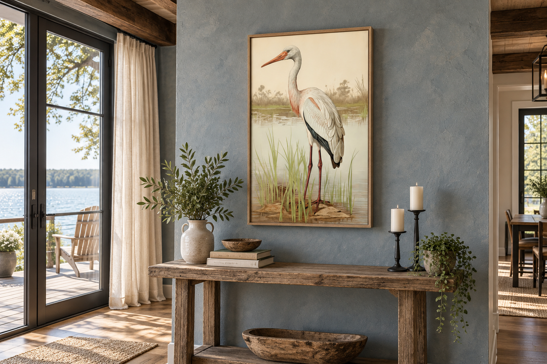 Vintage stork painting framed canvas wall art featuring a stork in reeds on a blue wall.