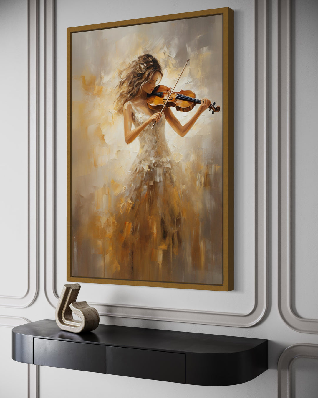 Framed canvas wall art of a violinist in a gold dress hanging above a black console table.