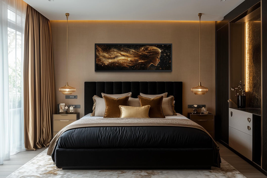 Black and gold celestial canvas wall art with a woman's profile.