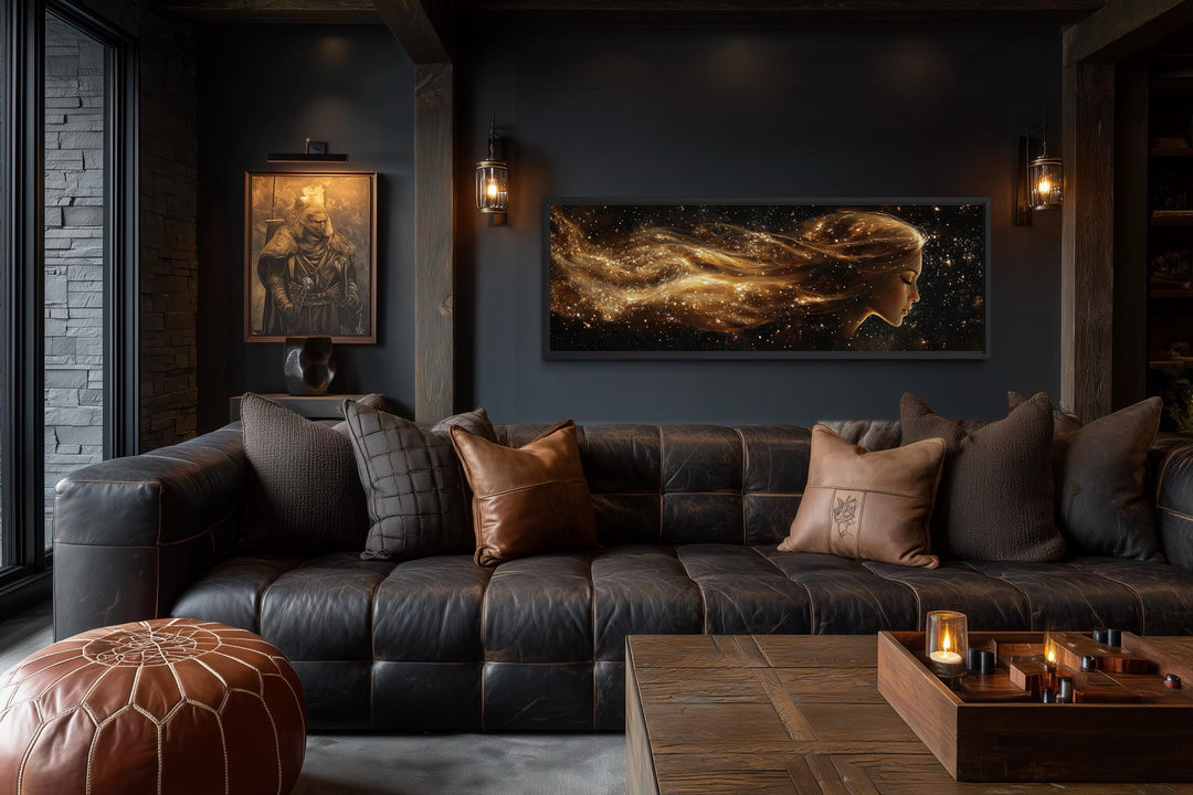 Black and gold celestial canvas art with a woman's profile.