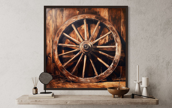 Wagon Wheel Wild West framed canvas wall art on a rustic shelf with decorative objects.