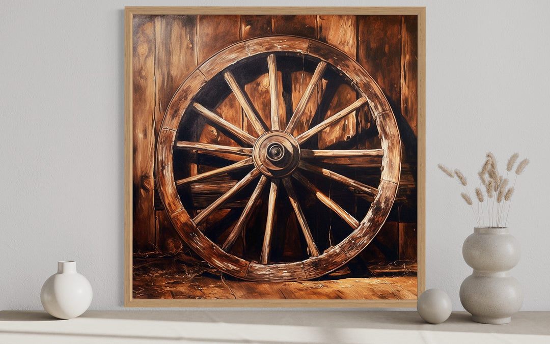 Wagon Wheel Wild West Framed Canvas Wall Art featuring a rustic wooden wheel on a wood background.