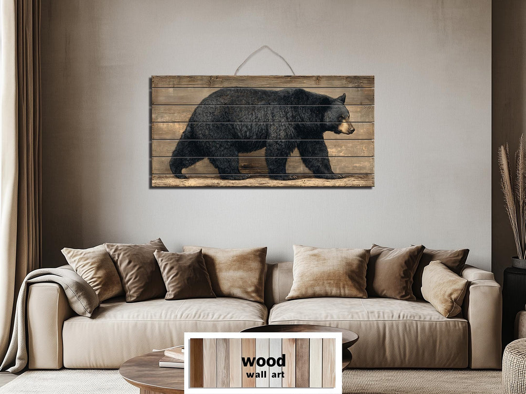 Large horizontal wood wall art featuring a walking black bear on rustic timber planks.