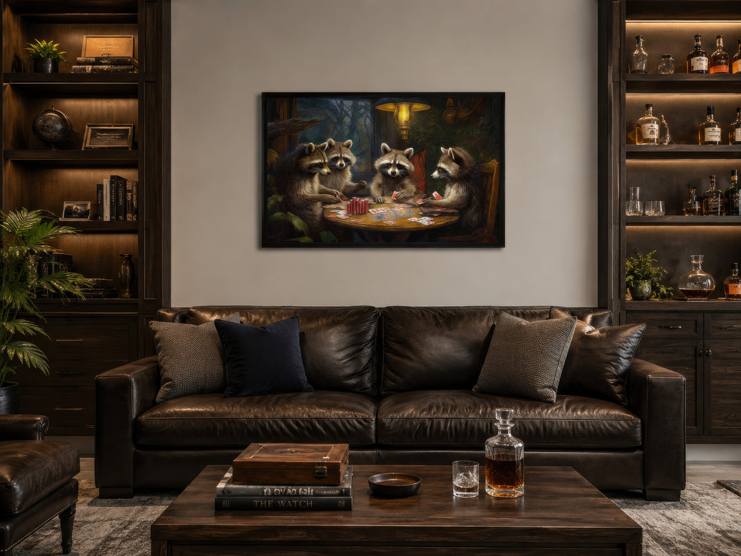 Framed canvas wall art of raccoons playing poker hanging above a leather sofa in a man cave.