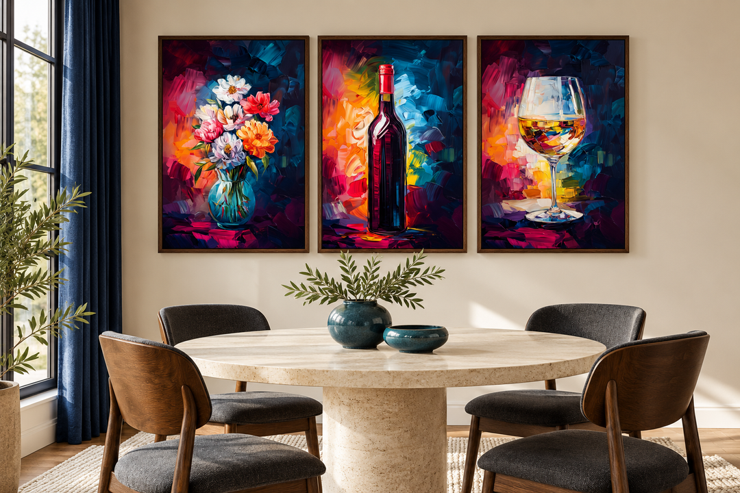 Set of three colorful canvas prints of a flower vase, wine bottle, and wine glass in a dining room.