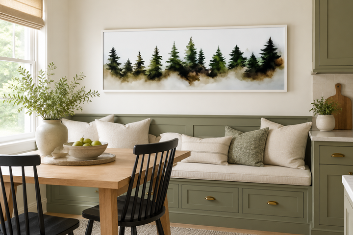 Foggy green pine trees forest horizontal watercolor wall art above a green kitchen breakfast nook.