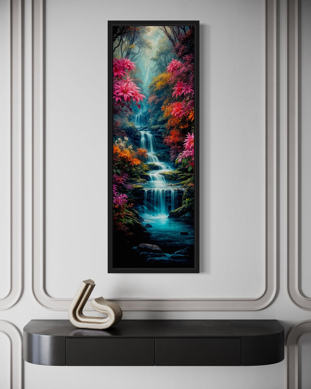 Vertical framed canvas of a colorful waterfall in an enchanted forest above a black console table.