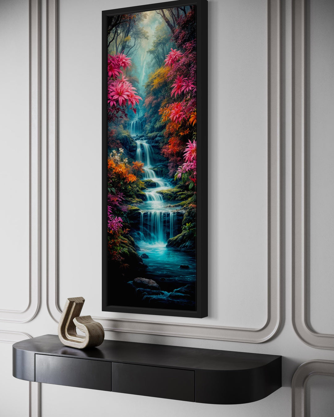 Tall narrow vertical framed canvas art of a waterfall in an enchanted forest with pink flowers.