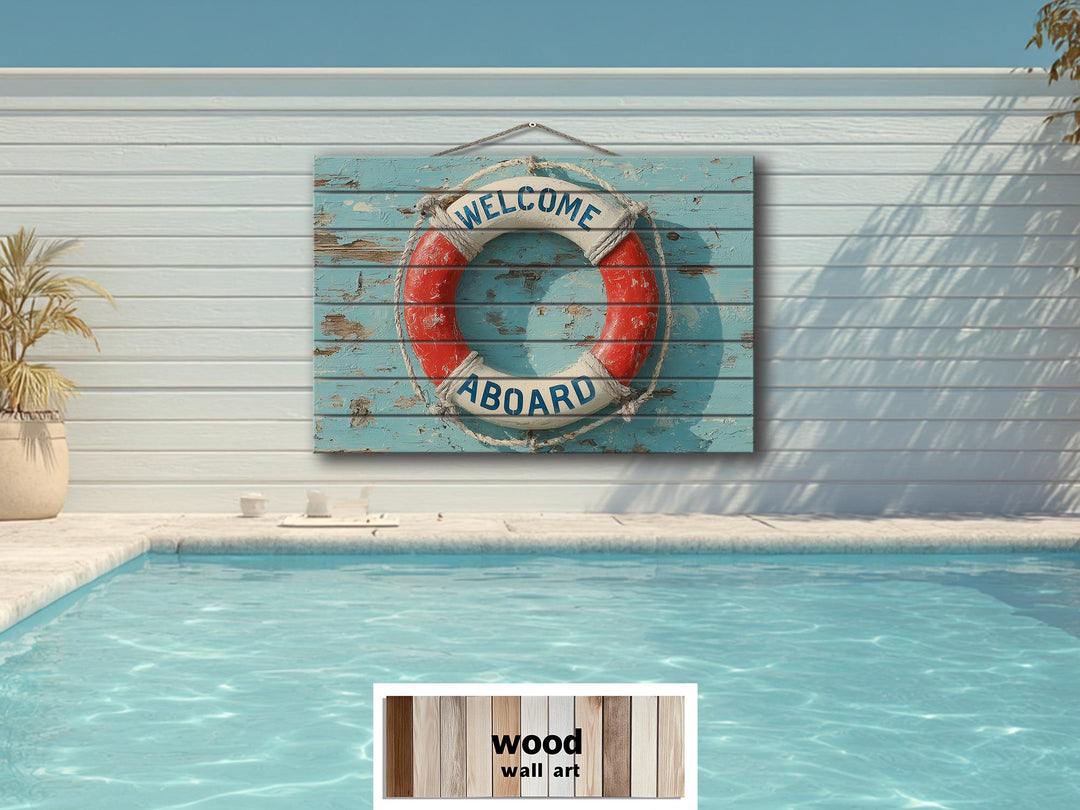 A distressed wood sign featuring a nautical lifebuoy with Welcome Aboard text hangs above a pool.