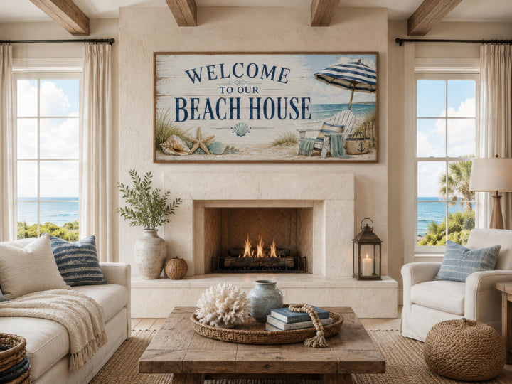 Welcome To Our Beach House rustic canvas print hanging above a fireplace in a coastal living room.