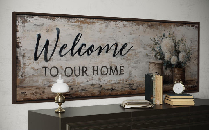 Welcome to Our Home long horizontal farmhouse wall art with flowers above a dark wood console table.
