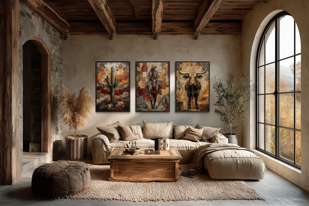 Western wall art set with cowboy, longhorn bull, and desert cactus canvas prints over a beige sofa.