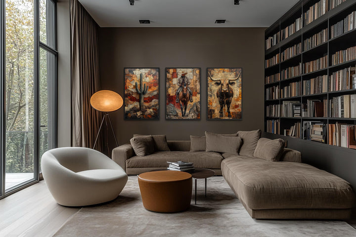 Three vertical canvas prints of a cactus, cowboy on a horse, and a longhorn bull in a modern room.