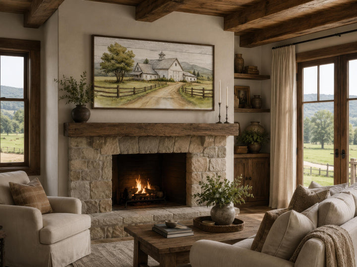 White barn wall art in a rustic farmhouse living room above a stone fireplace with a warm fire.