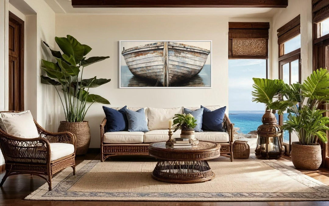 Framed canvas wall art featuring a close-up of a rustic, weathered white and brown boat.