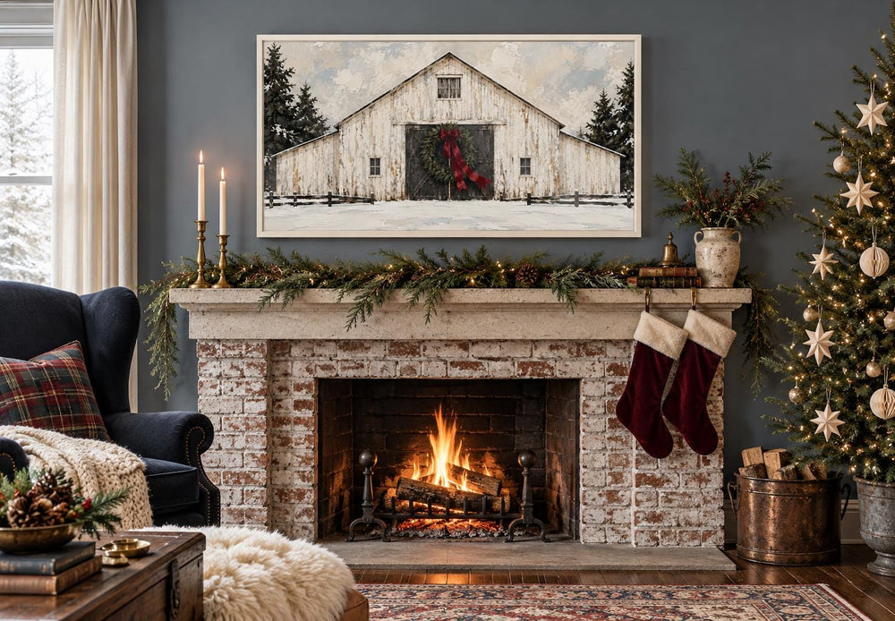 White Christmas Barn framed canvas wall art above a fireplace with festive holiday decor.