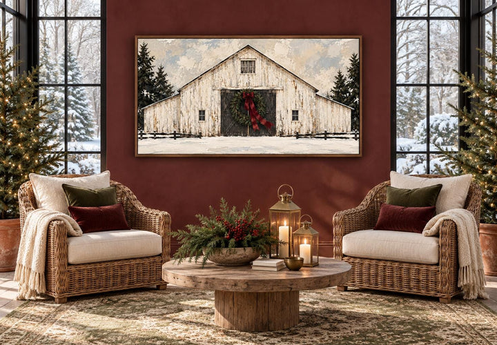 White Christmas Barn framed canvas wall art with an evergreen wreath and burgundy bow.