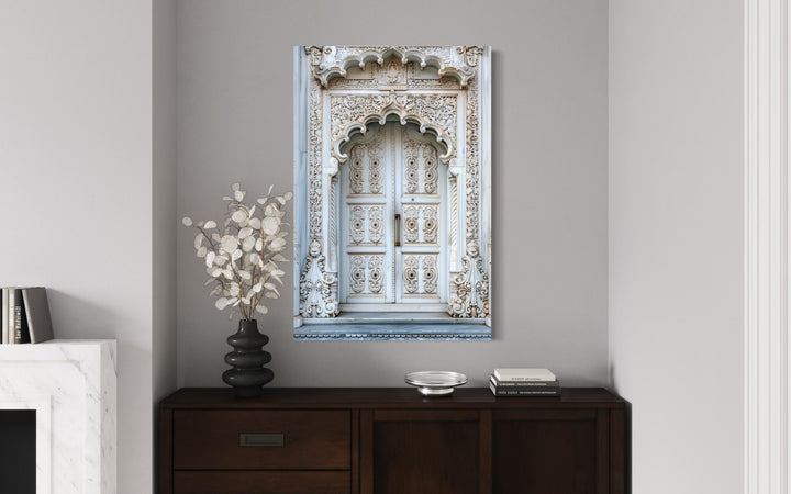 White Grey Indian Door Framed Canvas Wall Art hanging above a dark wood sideboard in a modern room.