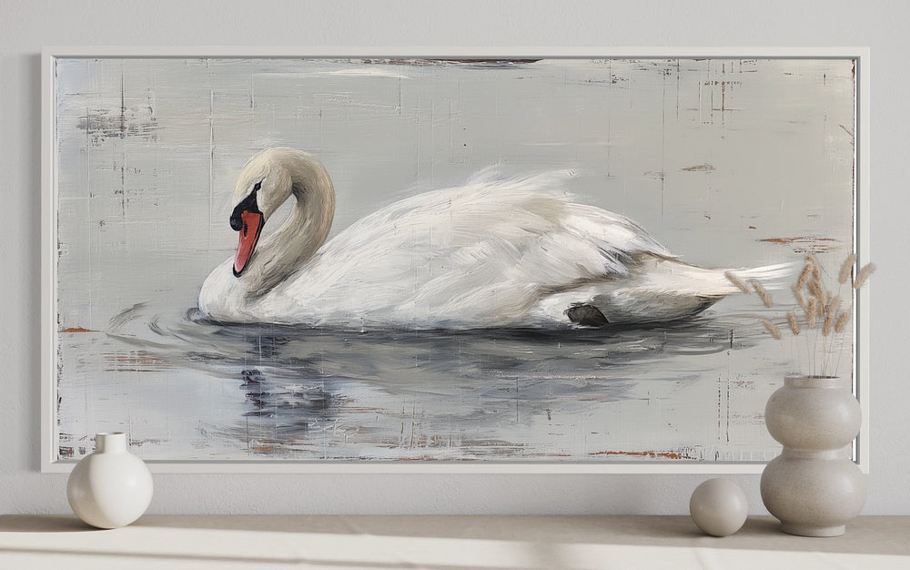 Rustic canvas painting of a white swan on water in a white frame, styled with farmhouse decor.