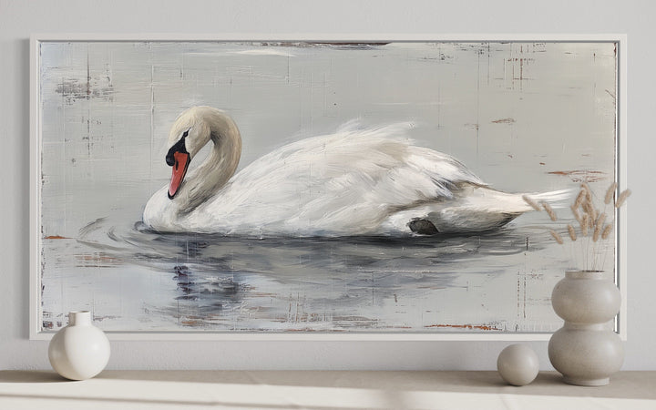 Rustic canvas painting of a white swan on water in a white frame, styled with farmhouse decor.