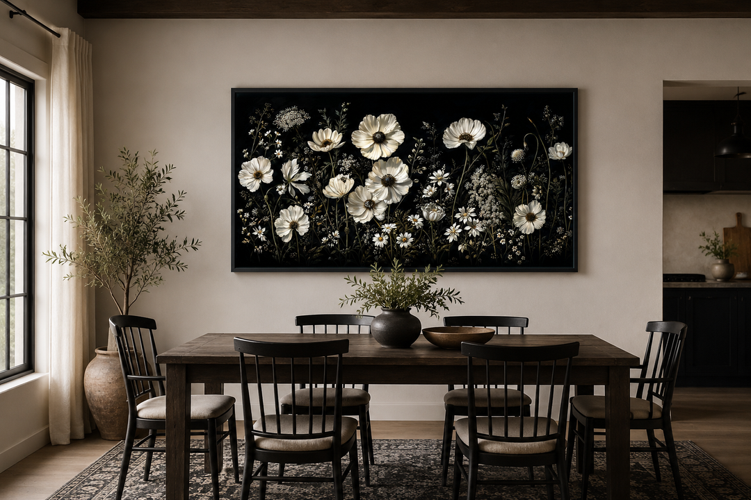Moody framed canvas wall art featuring white wildflowers on a dark black background.