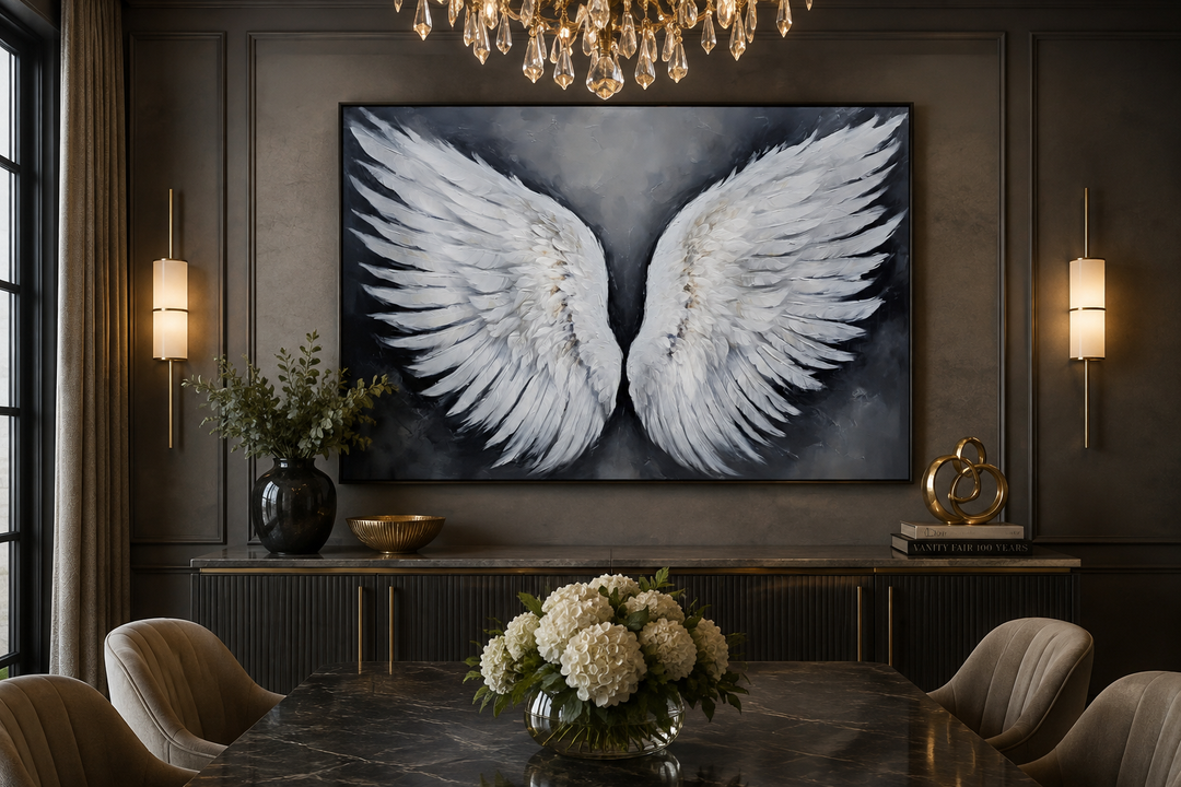 Large canvas wall art of white angel wings on a dark grey background in a modern dining room.