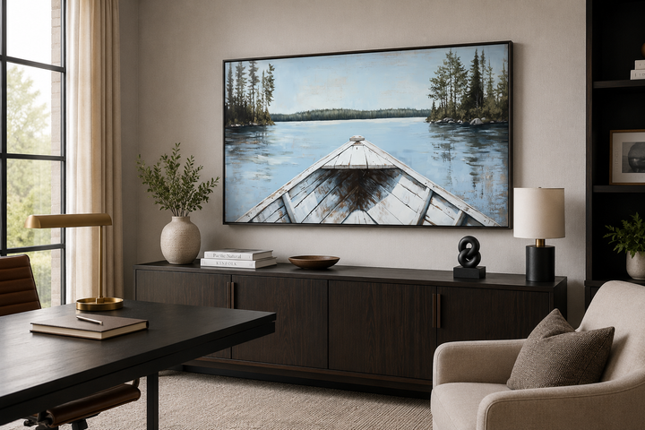 Lake View Wall Art featuring a white canoe on a blue lake with evergreens in a modern office setting.