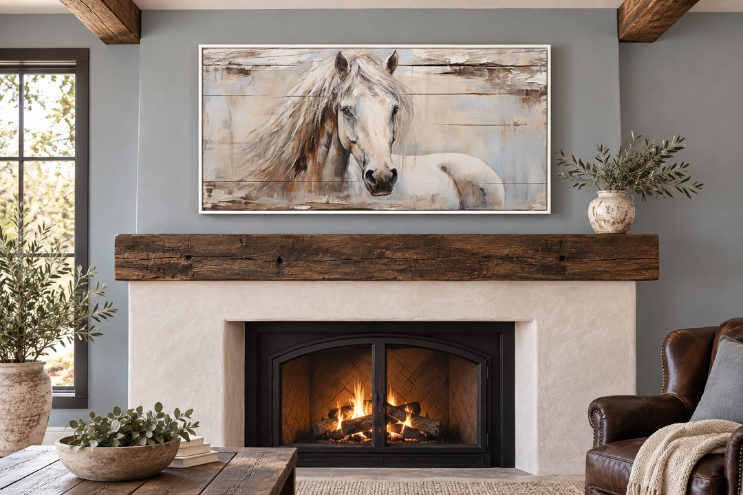 Rustic white horse painting on distressed wood canvas above a cozy fireplace in a farmhouse room.