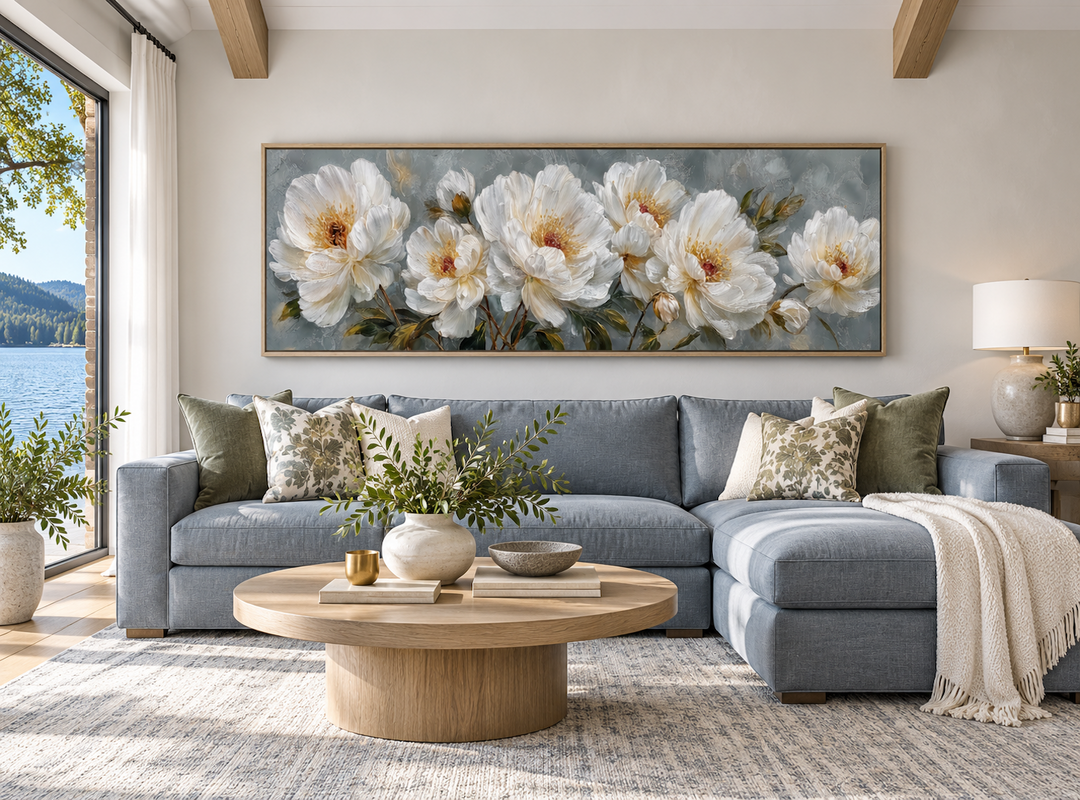 White Cream Peonies Long Horizontal Floral Framed Canvas Wall Art above a blue sectional sofa.