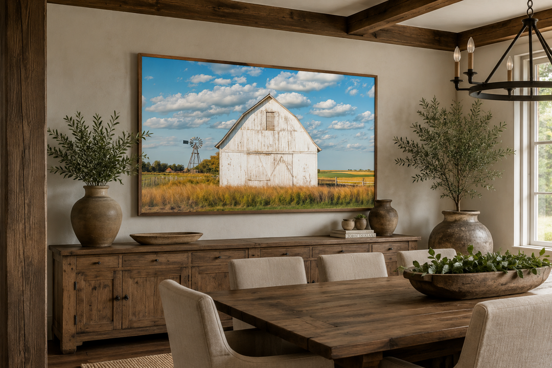 Old weathered white barn with windmill framed canvas wall art in a rustic farmhouse dining room.