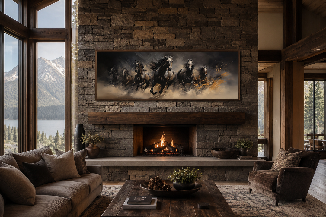 Long horizontal canvas art of wild brown galloping horses above a stone fireplace in a rustic room.