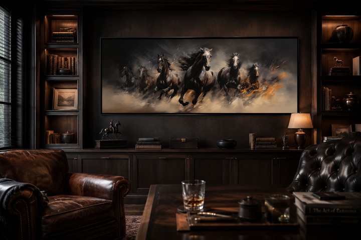 Long horizontal canvas wall art of wild brown galloping horses in a dark, masculine office setting.