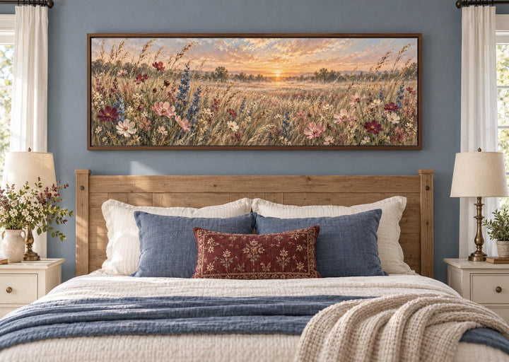Wildflower Meadow Sunrise Landscape long narrow canvas wall art above a wooden headboard.