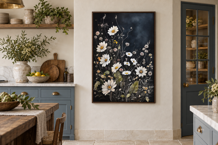 Black and white wildflowers chamomile framed canvas wall art hanging in a rustic kitchen.